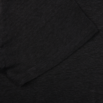 A close up of a breathable Paige Black Linen Capri Collar Polo Shirt.