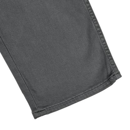 Close-up of the bottom hem and seam of Paige's Charcoal Cotton Transcend Federal Slim Jeans, ensuring a comfortable fit.