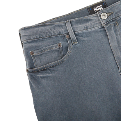A close up of a pair of Paige Grey-Blue Cotton Stretch Lennox Jeans.