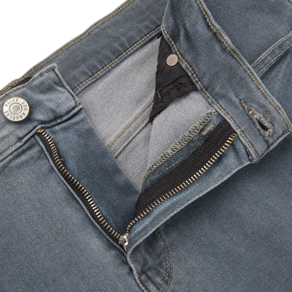 A close up of a pair of Paige Grey-Blue Cotton Stretch Lennox jeans with a zippered pocket.