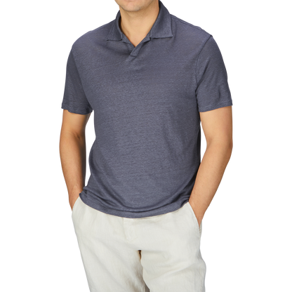 A man wearing a Paige Grey Blue Linen Capri Collar Polo Shirt and khaki pants.