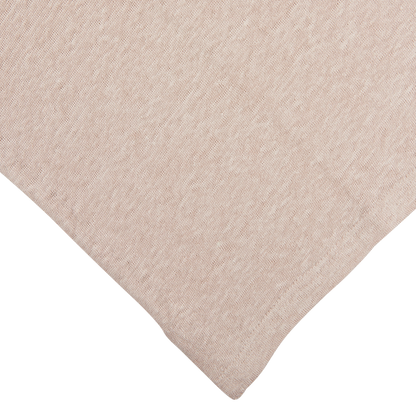Close-up of a textured Paige Light Pink Linen Capri Collar Polo Shirt fabric with a corner folded over on a white background.