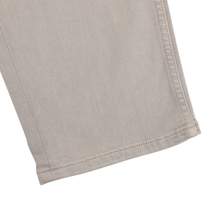 Close-up of the hem of Paige's Moroccan Clay Cotton Transcend Federal Slim Jeans, featuring visible stitching and crafted for ultimate comfort and durability.