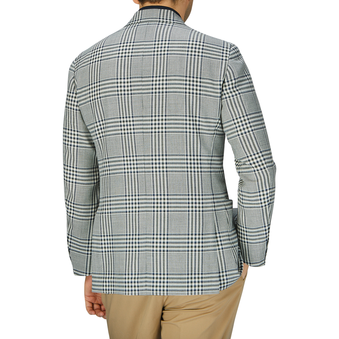 Woman from behind wearing a Ring Jacket Blue Green Glen Check Balloon Wool Blazer and beige trousers, standing against a gray background.