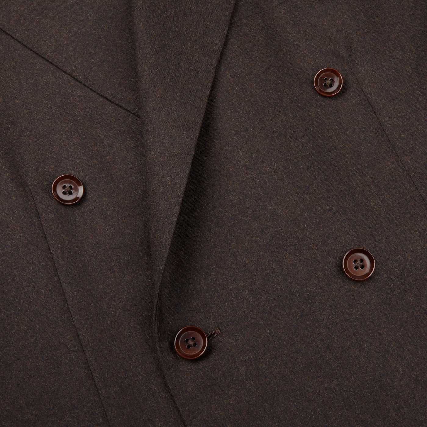 A close up of a Ring Jacket Dark Brown Wool Flannel DB Suit with buttons.