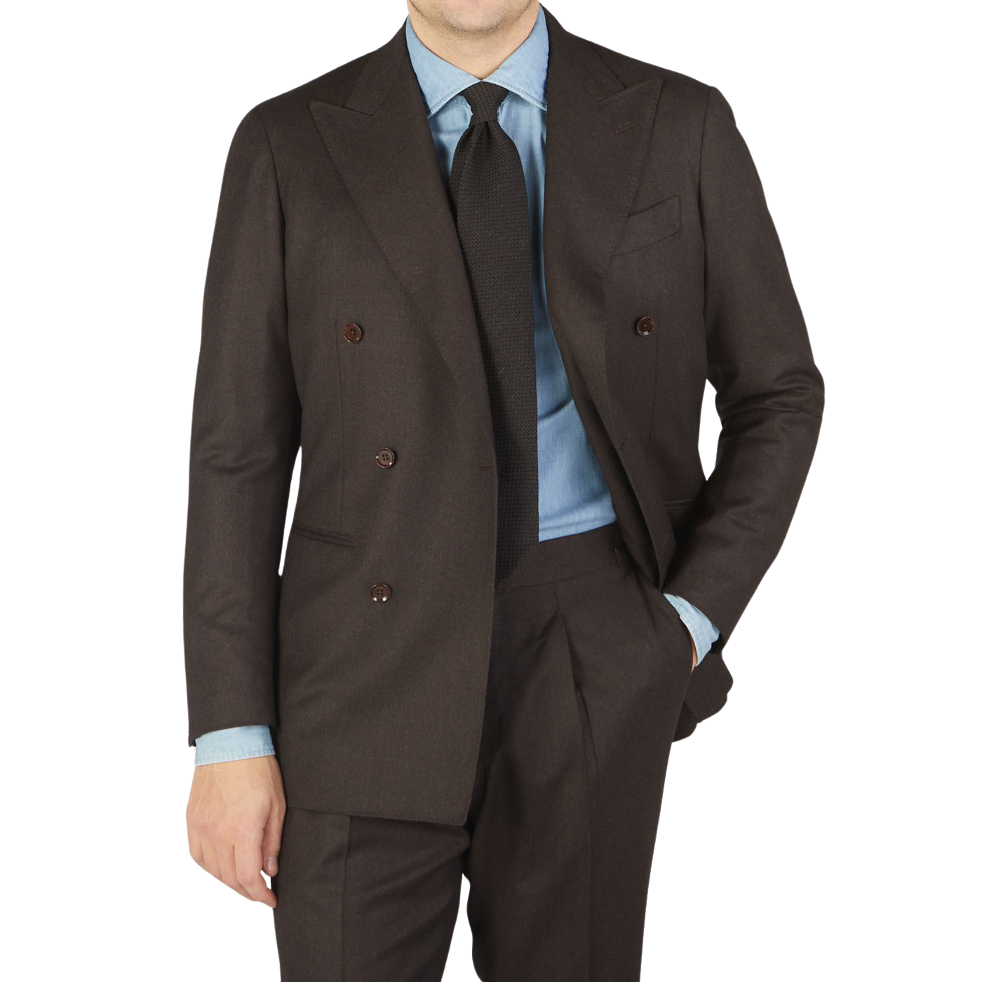 A man in a Ring Jacket Dark Brown Wool Flannel DB Suit is posing for a photo.