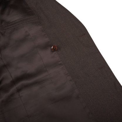 A close up of a Ring Jacket Dark Brown Wool Flannel DB Suit with buttons.