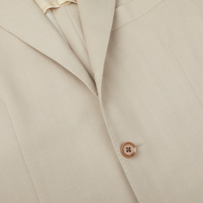 A close up of a Light Beige Herringbone Wool Suit by Ring Jacket.