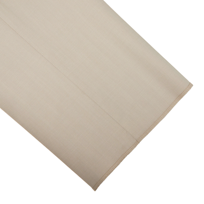 A light beige herringbone Ring Jacket Wool Suit made from virgin wool on a white background.