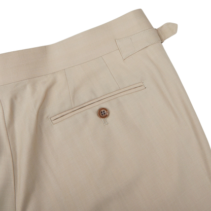 A close up of the Light Beige Herringbone Wool Suit pants by Ring Jacket.