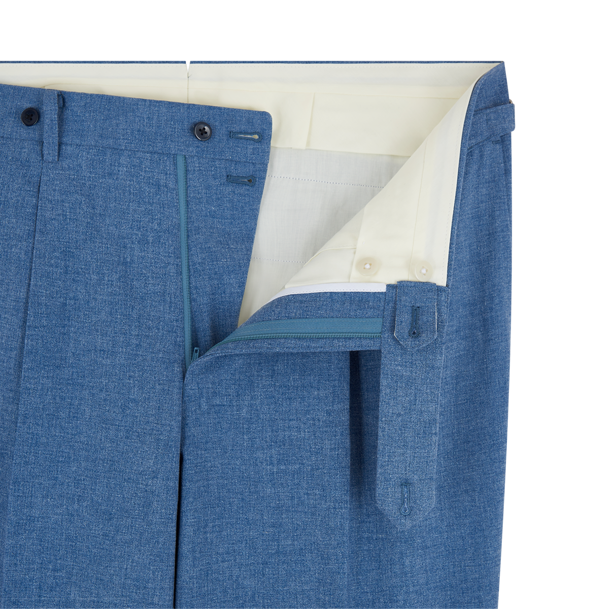 Close-up of Ring Jacket's Pale Blue Melange Tropical Wool/Cotton/Silk Suit trousers with front flap open, revealing a white lining, light blue zipper, double-button closure, and right-side extended waistband tab with button and belt loop. , available at Richard Gelding Mayfair
