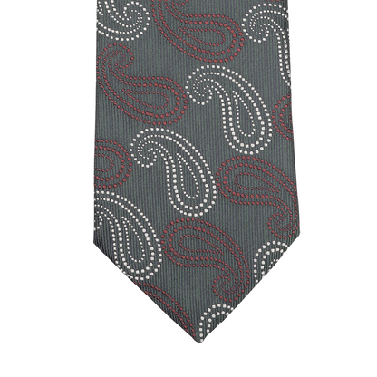 A Seaward & Stearn dark green tie featuring a large paisley pattern is elegantly displayed against a plain background, showcasing its craftsmanship from handmade silk.