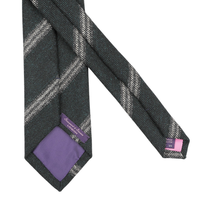 Seaward & Stearn presents the Dark Green Striped Wool Tie, crafted from pure wool and adorned with a diagonal plaid pattern and purple lining, complete with two tags.