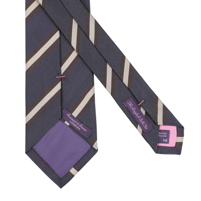 Navy blue and brown striped silk tie by Seaward & Stearn, featuring a purple lining and embroidered labels, meticulously handmade in England.