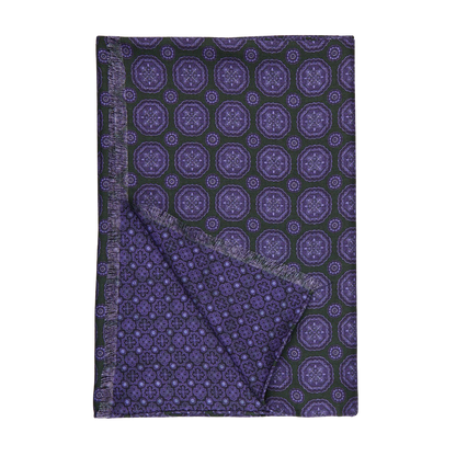 A green and purple geometric patterned double sided scarf by Silvio Fiorello.