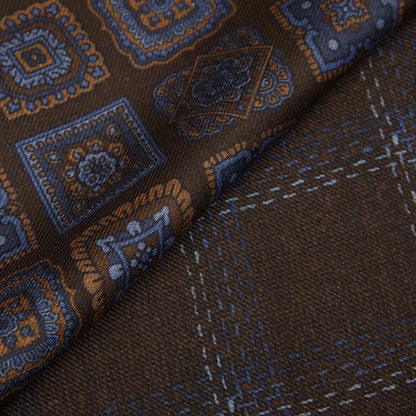 A close up of a brown paisley Silvio Fiorello tie.