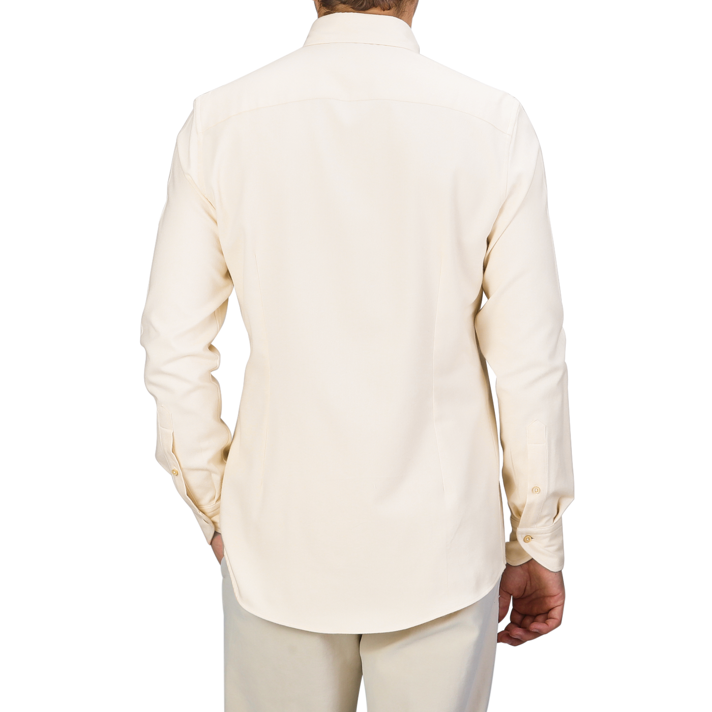 A person wearing a Cream Cotton Flannel Slimline BD Shirt from Stenströms and light, slim-fit trousers is shown from the back.