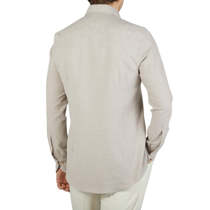 The back view of a man wearing a Light Beige Brushed Cotton Slimline Stenströms shirt.