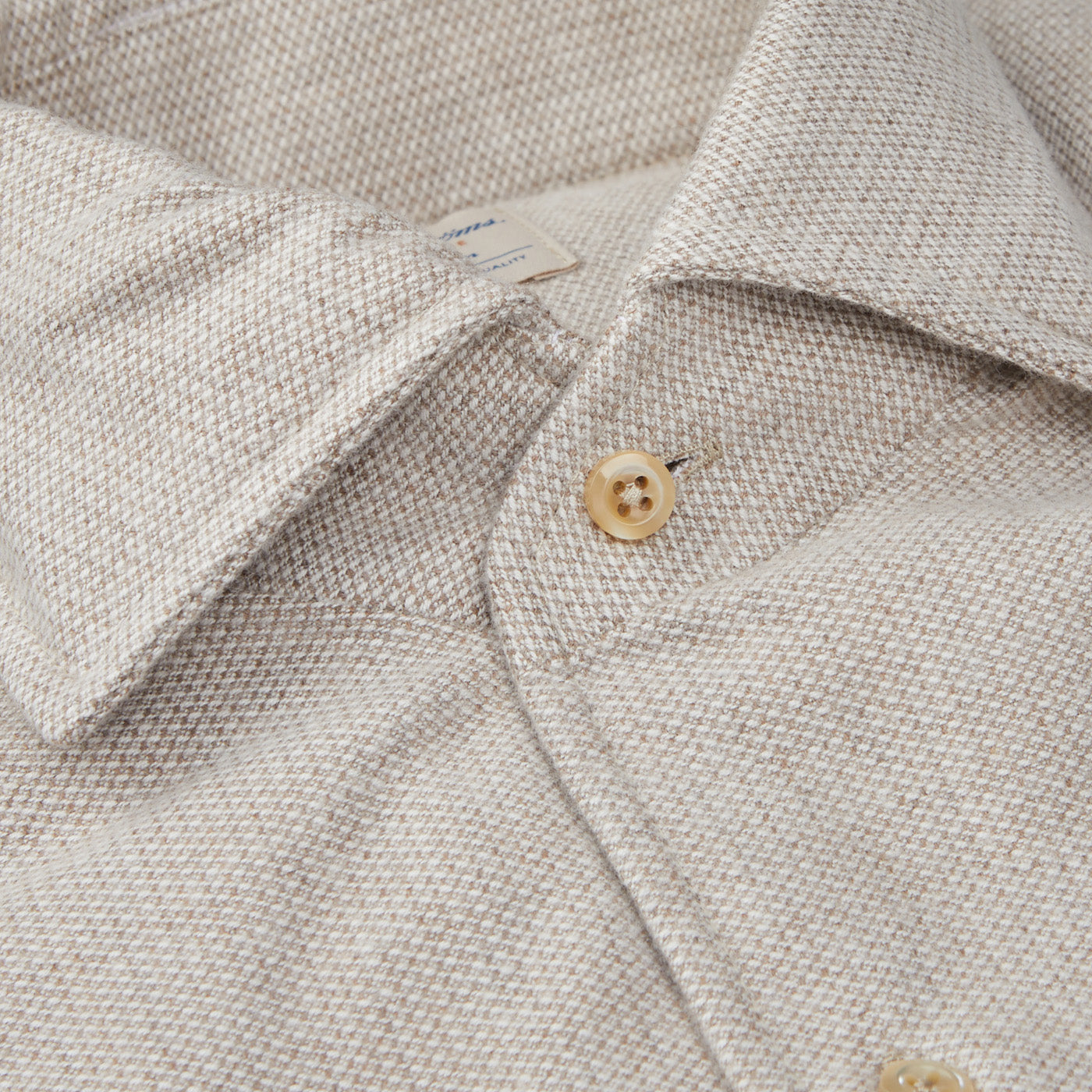 A close up of a Stenströms Light Beige Brushed Cotton Slimline Shirt with buttons.