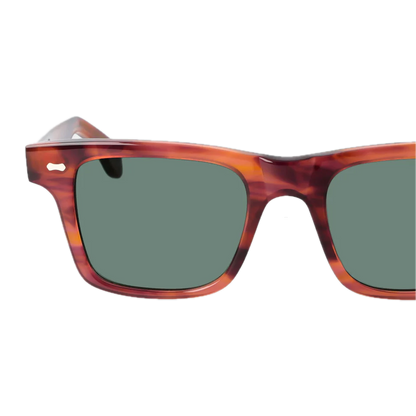 Handmade tortoiseshell pattern sunglasses with dark lenses on a black background - Denim Eco Havana sunglasses with Bottle Green Lenses 51mm by The Bespoke Dudes.