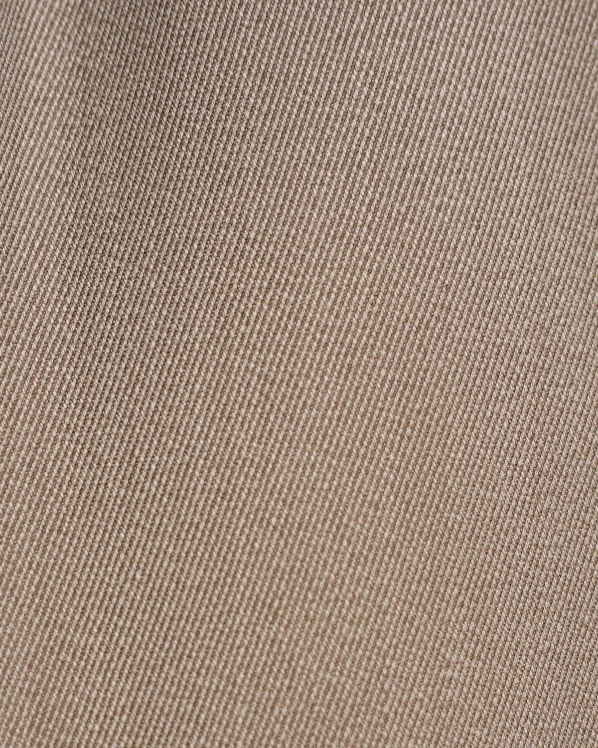 A close-up of Cavour Taupe Straight Leg Pleated VBC Covert Wool Trousers showing a taupe fabric with a distinct, fine diagonal twill weave that creates a subtle ribbed appearance across the tailored surface. , available at Richard Gelding Mayfair