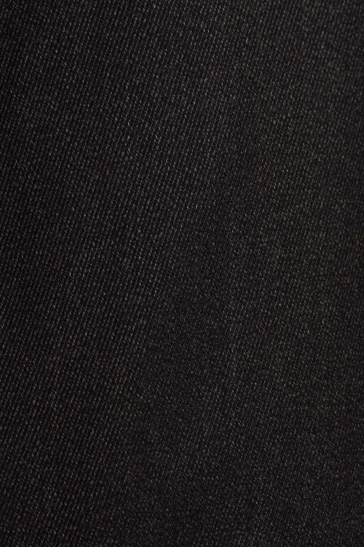 A close-up view of the charcoal grey fabric of the Charcoal Grey Straight Leg Pleated VBC Covert Wool Trousers, featuring a distinct diagonal twill weave with a tight, uniform, matte texture. , available at Richard Gelding Mayfair