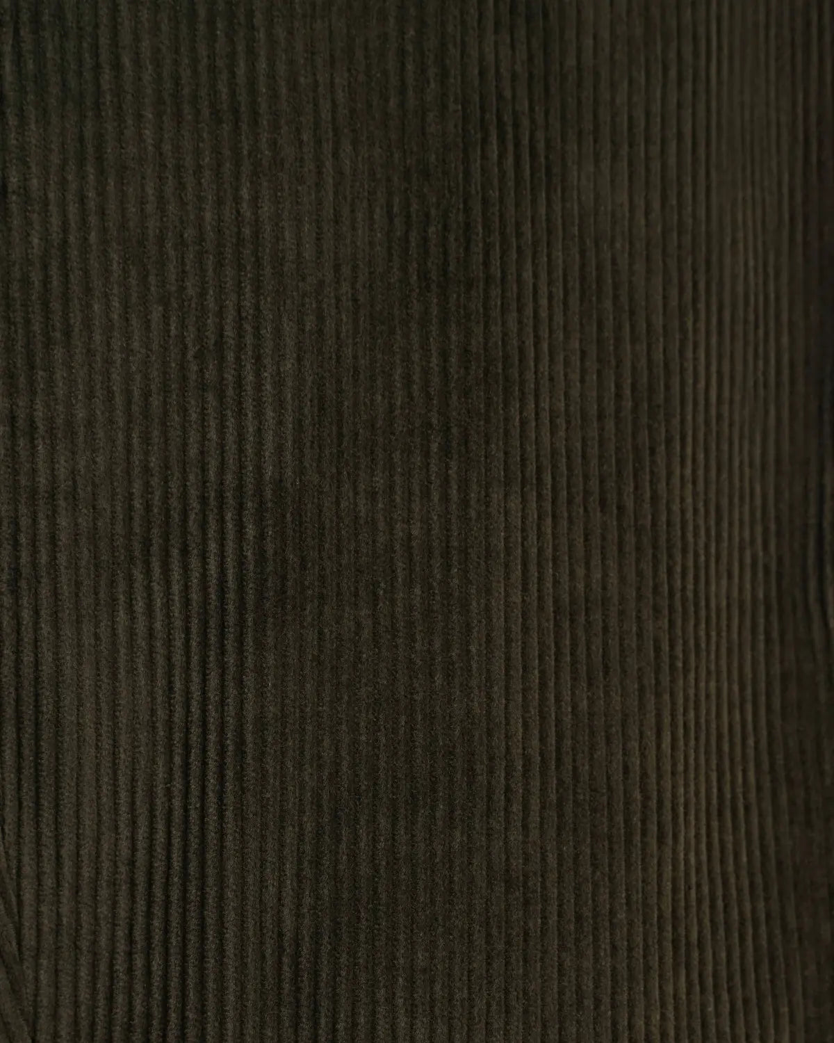 A close-up of dark olive green corduroy fabric from the Green Wide Leg Pleated Corduroy Trousers by Cavour, featuring distinct vertical ribs running parallel across the frame to create a textured, matte appearance. , available at Richard Gelding Mayfair