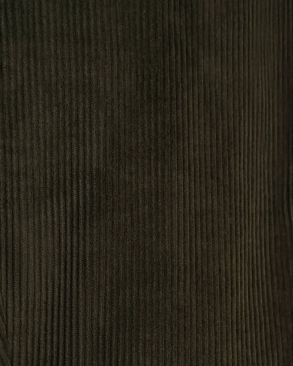 A close-up of dark olive green corduroy fabric from the Green Wide Leg Pleated Corduroy Trousers by Cavour, featuring distinct vertical ribs running parallel across the frame to create a textured, matte appearance. , available at Richard Gelding Mayfair